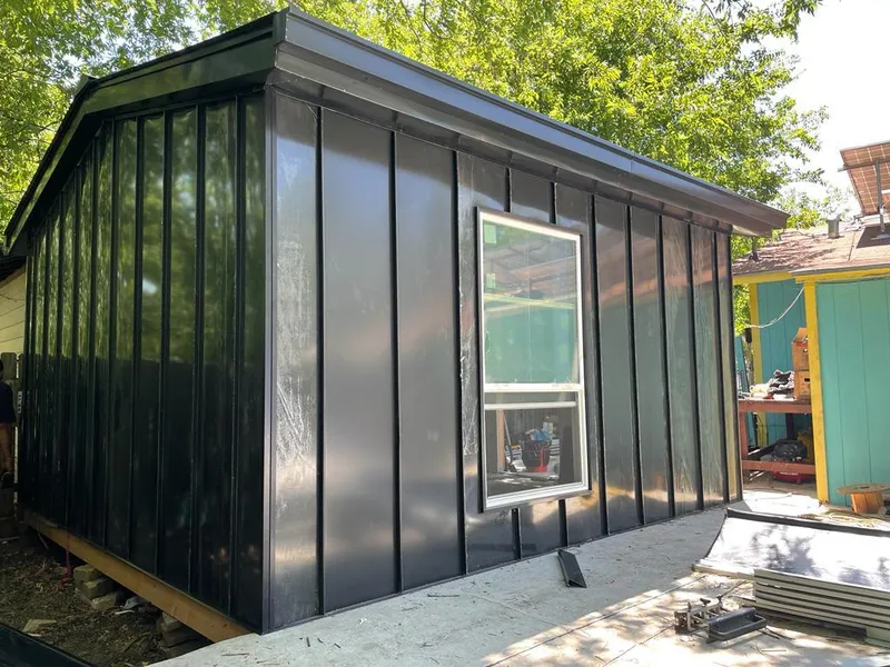 Black standing seam metal wall panels for Metal Roof Installation in Suwanee