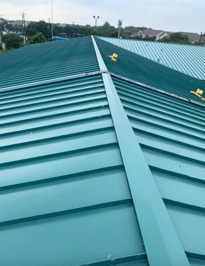 Green commercial metal roof ridge and valley for Metal Roof Repair in Suwanee